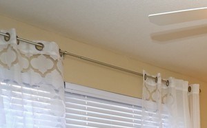 Large window and ceiling fan in master bedroom at Summit Pointe in 73139